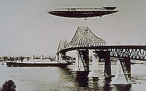 R100_over_Jacques_Cartier_Bridge_August_1930